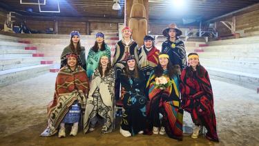 Ten Indigenous Role Models blanketed and pose for photos